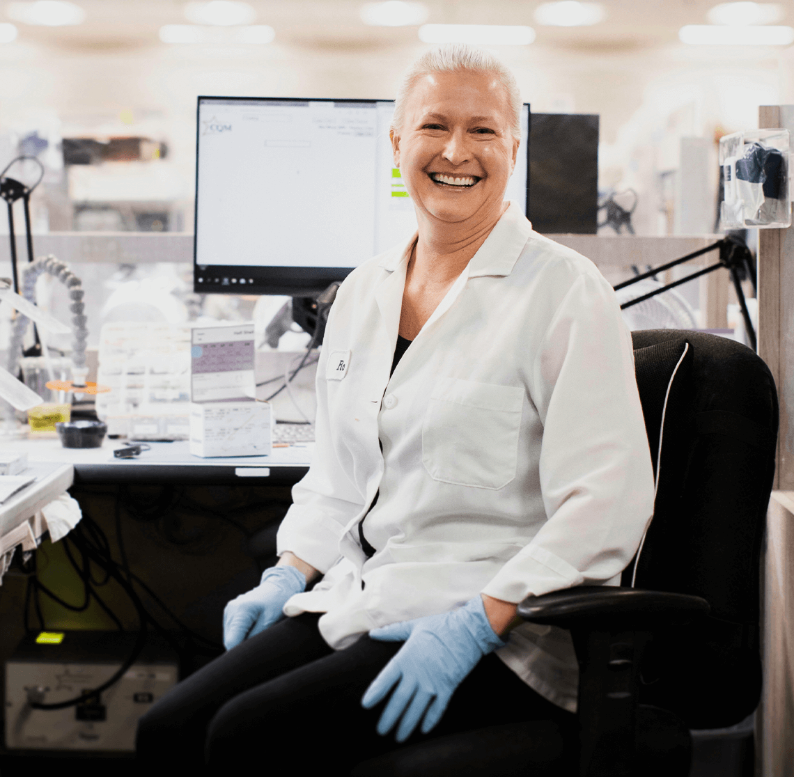Woman hearing aid technician smiling