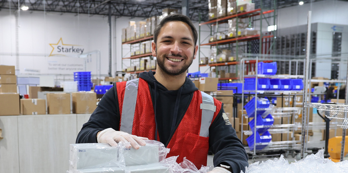 Male packaging a delivery