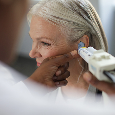 Woman getting an ear impression mold
