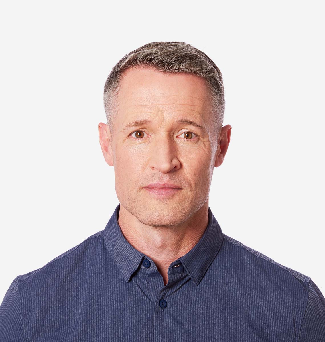 Bill wearing UP BTE 13 hearing aids