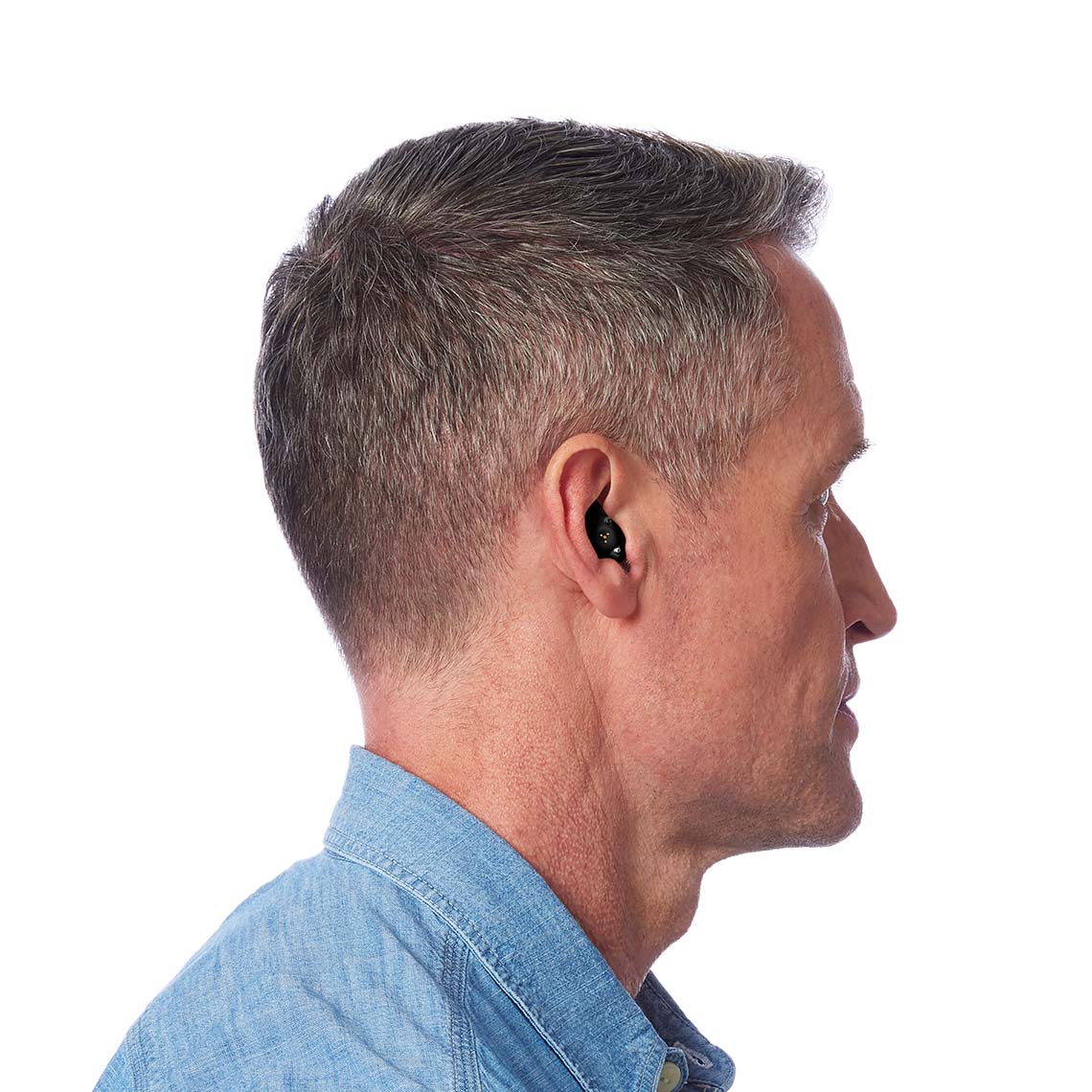 A Black ITE R shown in a man's ear