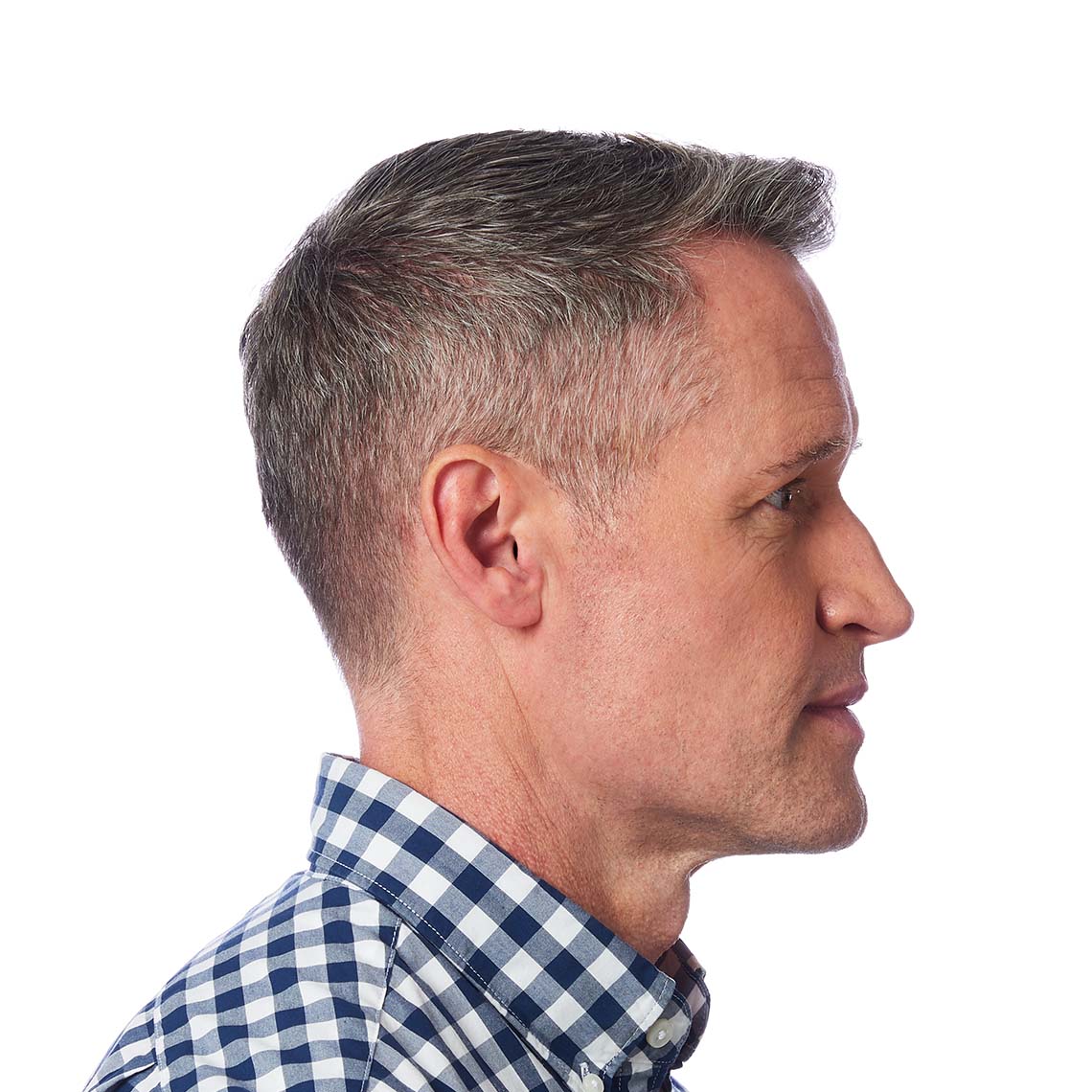 An IIC hearing shown in a man's ear