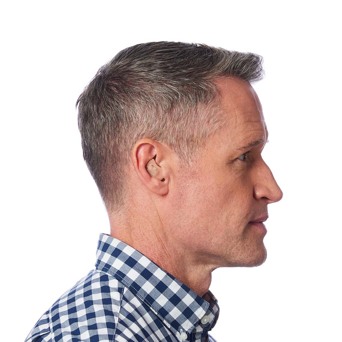 An ITE hearing aid shown in a man's ear