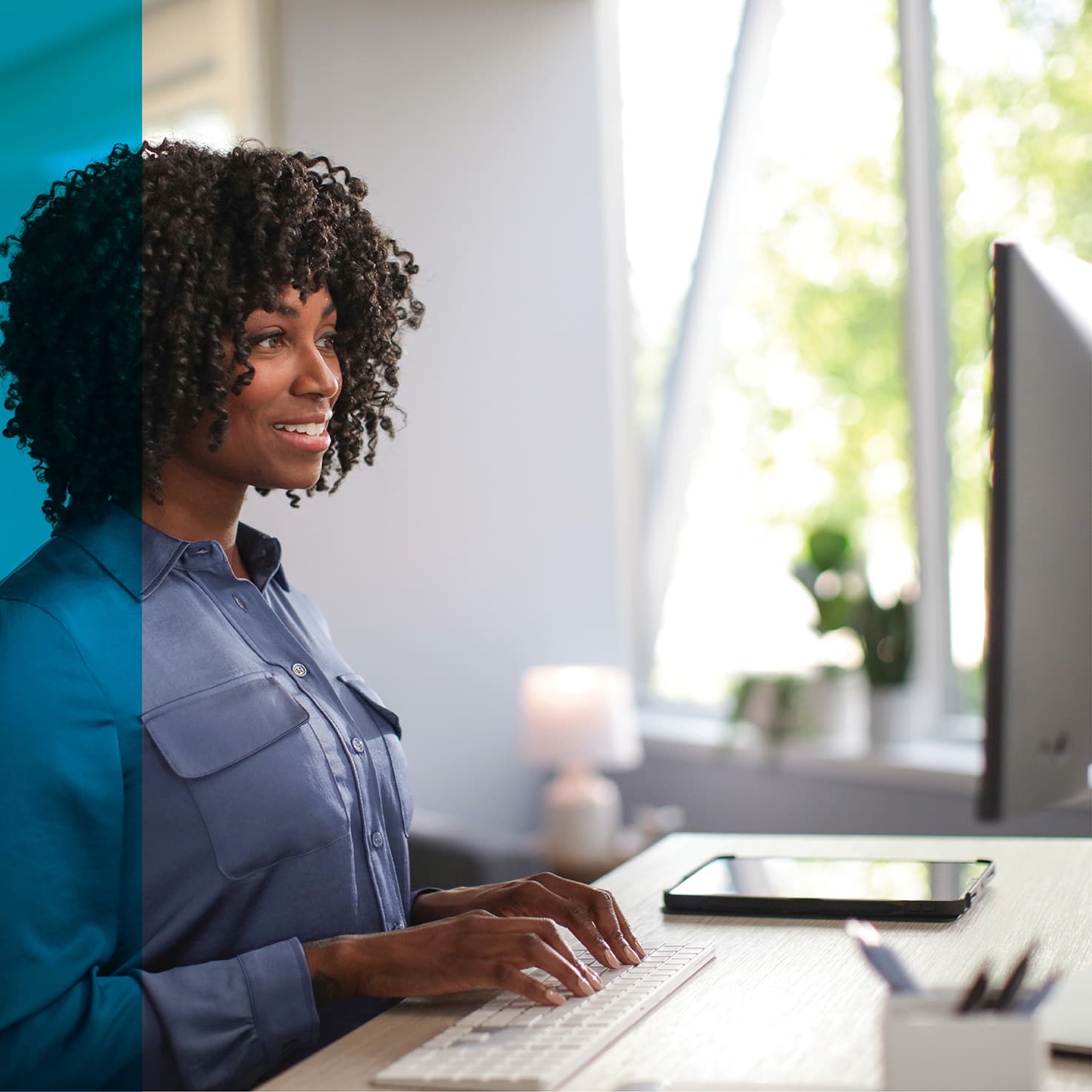 woman sitting at a computer